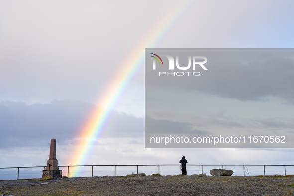 A rainbow is seen in North Cape, Norway,  on September 27, 2024. Nordkapp or North Cape is considered the northernmost point in Europe and o...