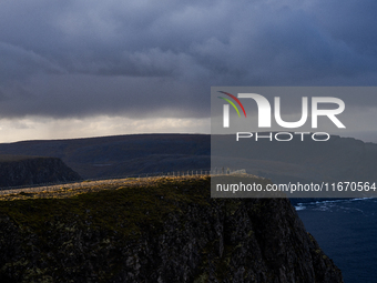 Tourists in North Cape, Norway,  on September 27, 2024. Nordkapp or North Cape is considered the northernmost point in Europe and one of the...