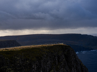 Tourists in North Cape, Norway,  on September 27, 2024. Nordkapp or North Cape is considered the northernmost point in Europe and one of the...