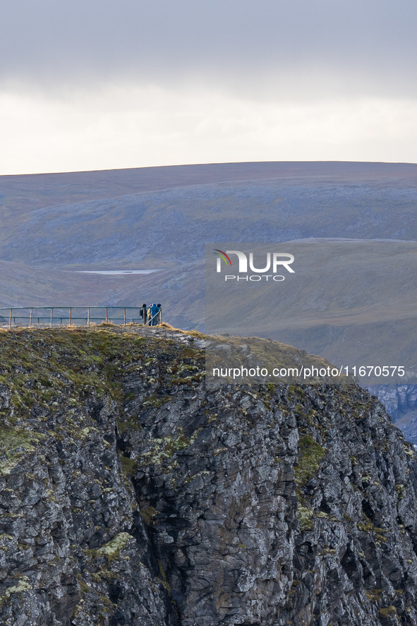 Tourists in North Cape, Norway,  on September 27, 2024. Nordkapp or North Cape is considered the northernmost point in Europe and one of the...