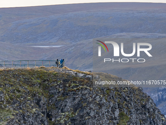 Tourists in North Cape, Norway,  on September 27, 2024. Nordkapp or North Cape is considered the northernmost point in Europe and one of the...