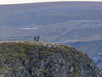 Tourists in North Cape, Norway,  on September 27, 2024. Nordkapp or North Cape is considered the northernmost point in Europe and one of the...