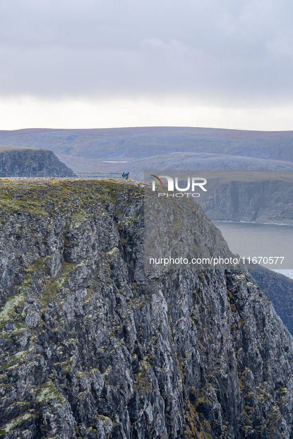 Tourists in North Cape, Norway,  on September 27, 2024. Nordkapp or North Cape is considered the northernmost point in Europe and one of the...