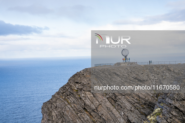 Tourists watches the steel globe in North Cape, Nordkapp, Norway on September 27, 2024. Nordkapp or North Cape is considered the northernmos...