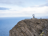 Tourists watches the steel globe in North Cape, Nordkapp, Norway on September 27, 2024. Nordkapp or North Cape is considered the northernmos...