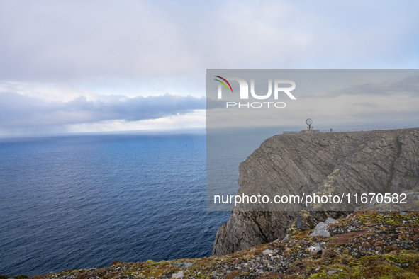 Tourists watches the steel globe in North Cape, Nordkapp, Norway on September 27, 2024. Nordkapp or North Cape is considered the northernmos...