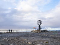 Tourists watches the steel globe in North Cape, Nordkapp, Norway on September 27, 2024. Nordkapp or North Cape is considered the northernmos...