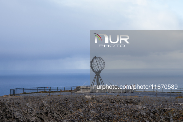 Tourists watches the steel globe in North Cape, Nordkapp, Norway on September 27, 2024. Nordkapp or North Cape is considered the northernmos...