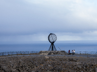 Tourists watches the steel globe in North Cape, Nordkapp, Norway on September 27, 2024. Nordkapp or North Cape is considered the northernmos...