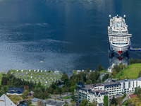 The AIDA Cruises ship docked in Geiranger, Norway, on September 18, 2024. Geiranger Fjord, a major tourist attraction in Norway, was designa...