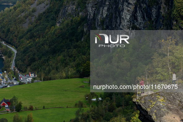 Tourists at the viewpoint of Geiranger, Norway, on September 18, 2024. Geiranger Fjord, a major tourist attraction in Norway, was designated...