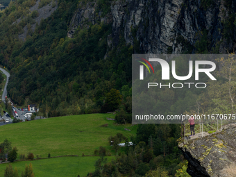 Tourists at the viewpoint of Geiranger, Norway, on September 18, 2024. Geiranger Fjord, a major tourist attraction in Norway, was designated...