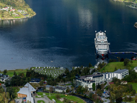 The AIDA Cruises ship docked in Geiranger, Norway, on September 18, 2024. Geiranger Fjord, a major tourist attraction in Norway, was designa...