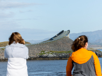 Tourists take pictures on a bridge along the Atlantic Ocean Road in Norway on September 18, 2024. The Atlantic Road was voted the most beaut...