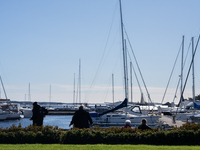 Boats at the harbor in Kristiansand, Norway on September 13, 2024. Kristiansand is a city and municipality in Agder county, Norway. The city...