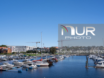 Boats at the harbor in Kristiansand, Norway on September 13, 2024. Kristiansand is a city and municipality in Agder county, Norway. The city...