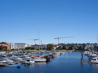 Boats at the harbor in Kristiansand, Norway on September 13, 2024. Kristiansand is a city and municipality in Agder county, Norway. The city...