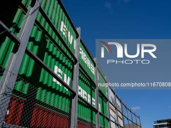 Evergreen containers are stacked at the port  in Kristiansand, Norway on September 13, 2024. Kristiansand is a city and municipality in Agde...