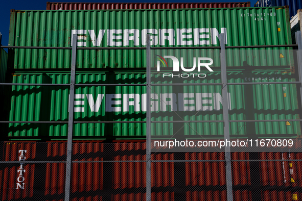 Evergreen containers are stacked at the port  in Kristiansand, Norway on September 13, 2024. Kristiansand is a city and municipality in Agde...