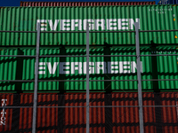 Evergreen containers are stacked at the port  in Kristiansand, Norway on September 13, 2024. Kristiansand is a city and municipality in Agde...