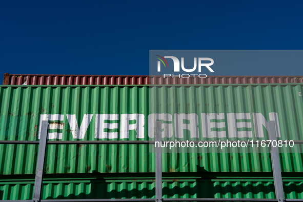 Evergreen containers are stacked at the port  in Kristiansand, Norway on September 13, 2024. Kristiansand is a city and municipality in Agde...