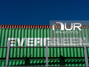 Evergreen containers are stacked at the port  in Kristiansand, Norway on September 13, 2024. Kristiansand is a city and municipality in Agde...