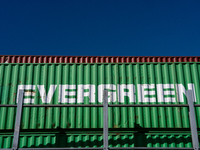 Evergreen containers are stacked at the port  in Kristiansand, Norway on September 13, 2024. Kristiansand is a city and municipality in Agde...