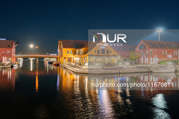 A general view of Fiskebrygga (The Fish Wharf) at night, in Kristiansand, Norway on September 13, 2024. Fiskebrygga  is a former fish landin...