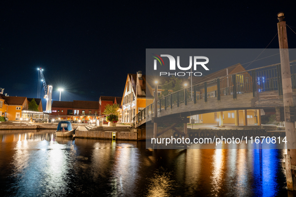 A general view of Fiskebrygga (The Fish Wharf) at night, in Kristiansand, Norway on September 13, 2024. Fiskebrygga  is a former fish landin...