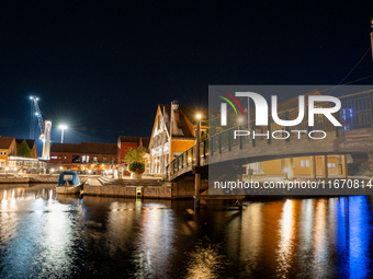 A general view of Fiskebrygga (The Fish Wharf) at night, in Kristiansand, Norway on September 13, 2024. Fiskebrygga  is a former fish landin...