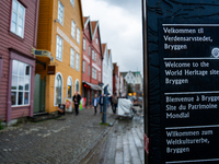 A welcome sign in the World Heritage site of Bryggen, in Bergen, Norway, on September 15, 2024. Bergen is the second-largest city in Norway,...