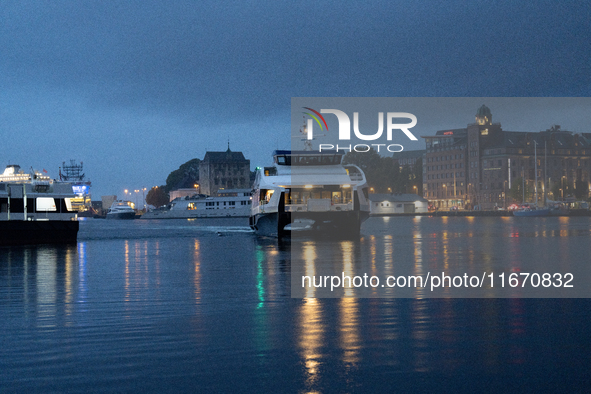 An electric tourist ferry arrives at the Bergen's harbor, in Bergen, Norway, on September 15, 2024. Bergen is the second-largest city in Nor...