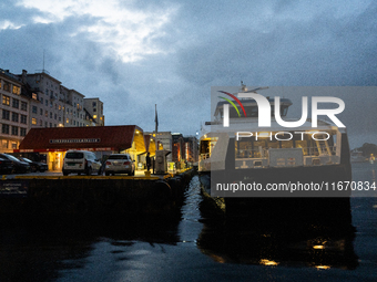 An electric tourist ferry arrives at the Bergen's harbor, in Bergen, Norway, on September 15, 2024. Bergen is the second-largest city in Nor...