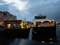 An electric tourist ferry arrives at the Bergen's harbor, in Bergen, Norway, on September 15, 2024. Bergen is the second-largest city in Nor...