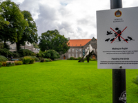 A sign in a park in Bergen, Norway, on September 16, 2024, prohibits feeding the birds, emphasizing the environmental issues caused by overf...