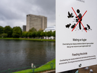 A sign in a park in Bergen, Norway, on September 16, 2024, prohibits feeding the birds, emphasizing the environmental issues caused by overf...