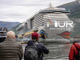 The AIDAnova cruise ship docked in the harbor of Flam, Norway, on September 17, 2024. Flam, located in the Aurlandsfjord, is a popular stop...