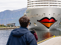 The AIDAnova cruise ship docked in the harbor of Flam, Norway, on September 17, 2024. Flam, located in the Aurlandsfjord, is a popular stop...