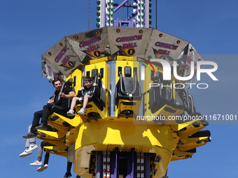 Rides take place during the 180th annual Markham Fall Fair in Markham, Ontario, Canada, on October 5, 2024. (