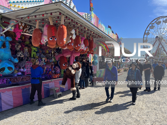 Rides and games take place during the 180th annual Markham Fall Fair in Markham, Ontario, Canada, on October 5, 2024. (