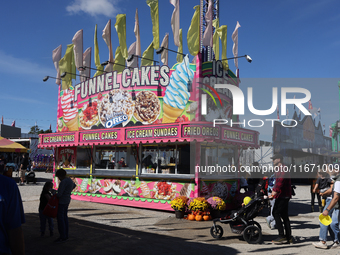 Funnel cakes are for sale during the 180th annual Markham Fall Fair in Markham, Ontario, Canada, on October 5, 2024. (