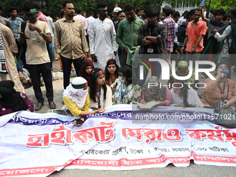 Students stage a demonstration on the High Court premises during a protest to demand the resignation of pro-Awami League  judges in Dhaka, B...