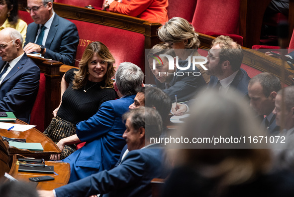 Barnier government ministers sit among the parliamentary benches during question time in Paris, France, on October 16, 2024. 