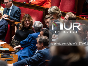 Barnier government ministers sit among the parliamentary benches during question time in Paris, France, on October 16, 2024. (