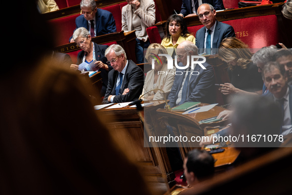 Prime Minister Michel Barnier (left) is at the National Assembly alongside Nathalie Delattre, Minister in Charge of Relations with the Parli...