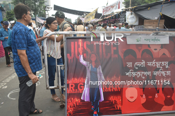 Citizens attend the Junior Doctors hunger strike to protest the rape and murder case of a medic in a government-run hospital in Kolkata, Ind...