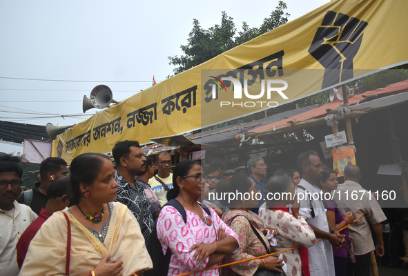 Citizens attend the Junior Doctors hunger strike to protest the rape and murder case of a medic in a government-run hospital in Kolkata, Ind...