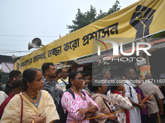 Citizens attend the Junior Doctors hunger strike to protest the rape and murder case of a medic in a government-run hospital in Kolkata, Ind...