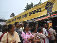 Citizens attend the Junior Doctors hunger strike to protest the rape and murder case of a medic in a government-run hospital in Kolkata, Ind...