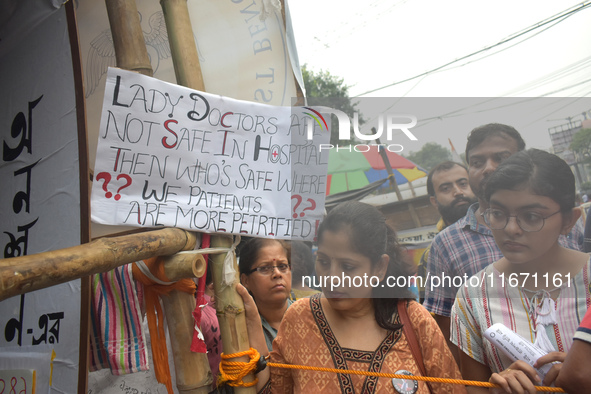 Citizens attend the Junior Doctors hunger strike to protest the rape and murder case of a medic in a government-run hospital in Kolkata, Ind...